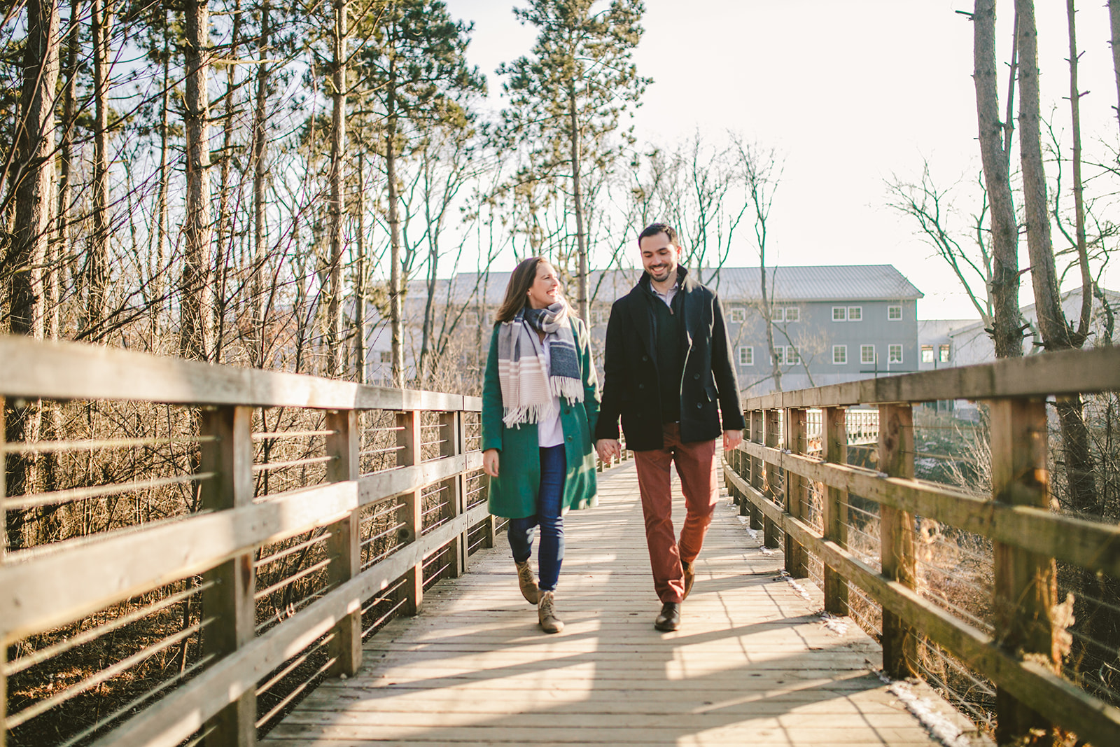 couple walks around epic systems campus for their engagement session in madison, wisconsin