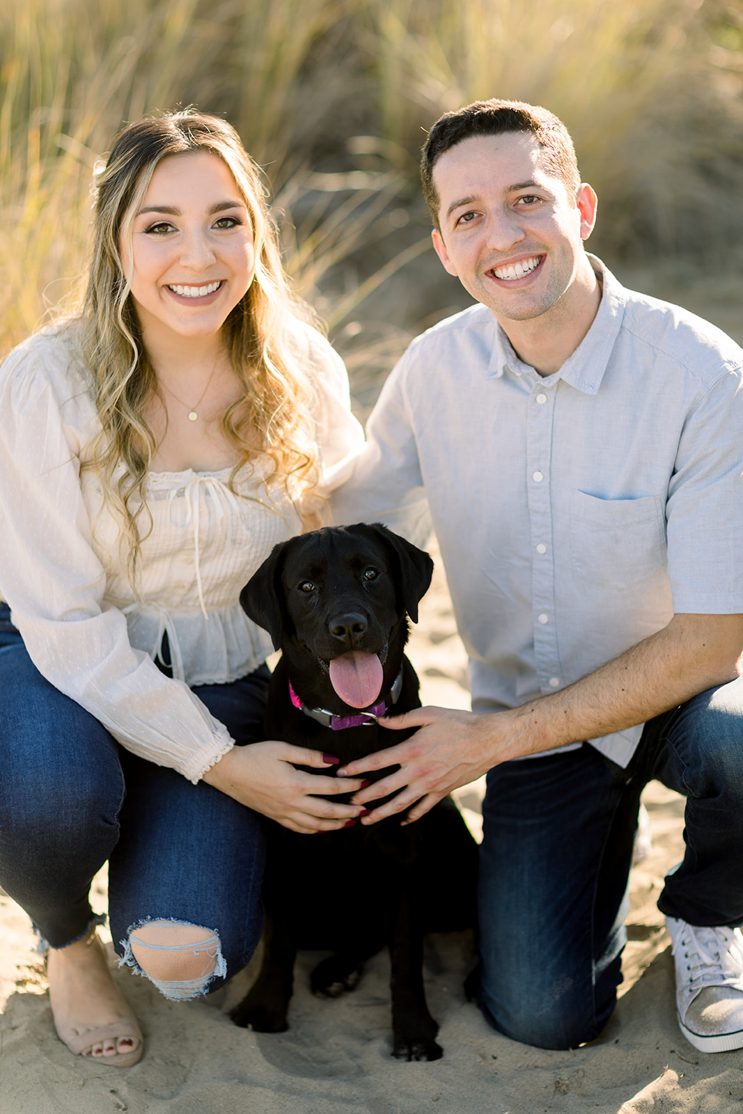 Cute engagement photos with their black labrador