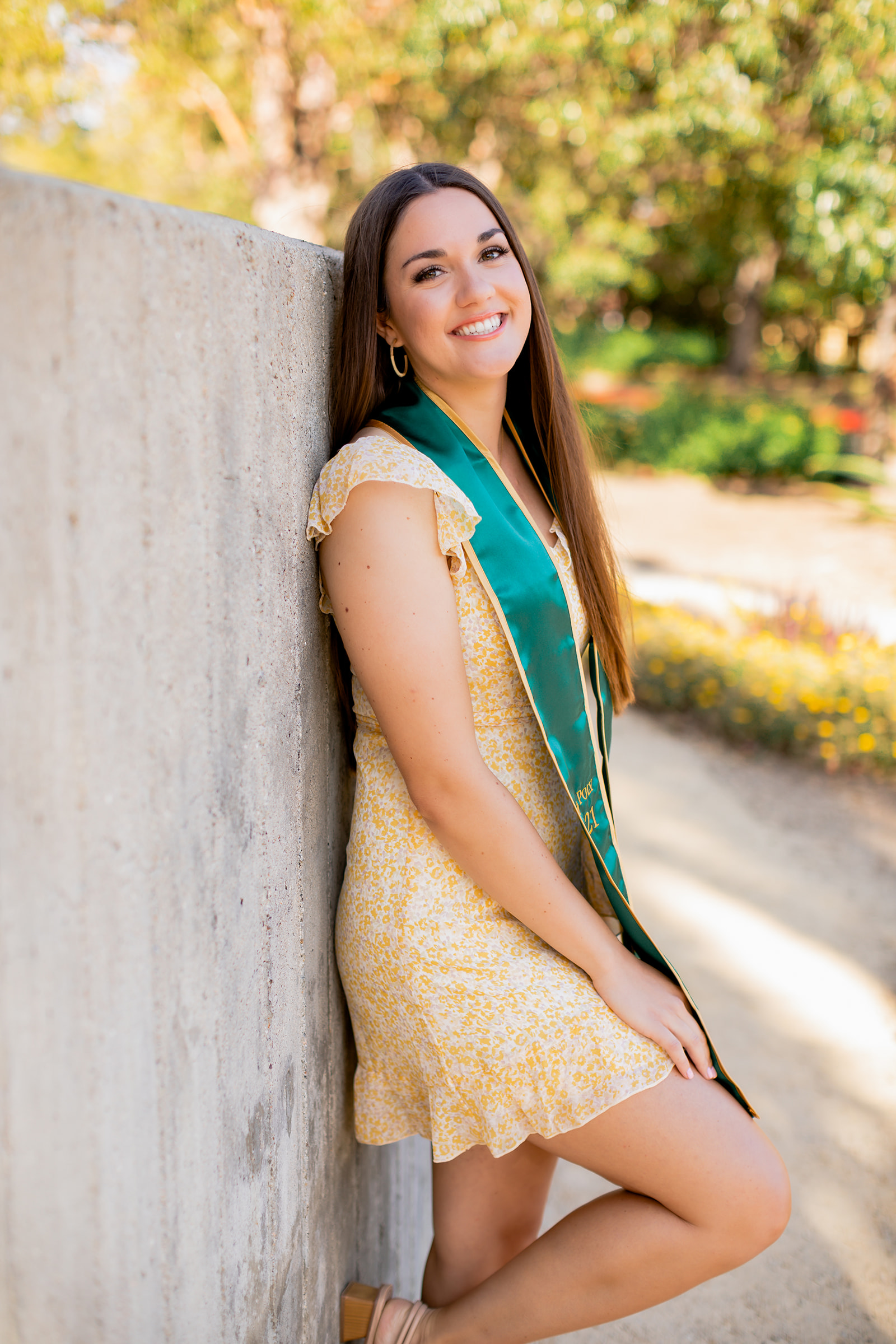 Cal Poly Graduate wears yellow sun dress in her senior portraits