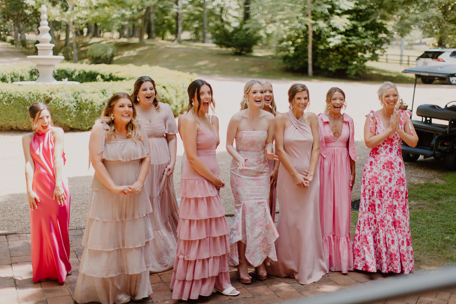 mixed-matched pink bridesmaids dresses