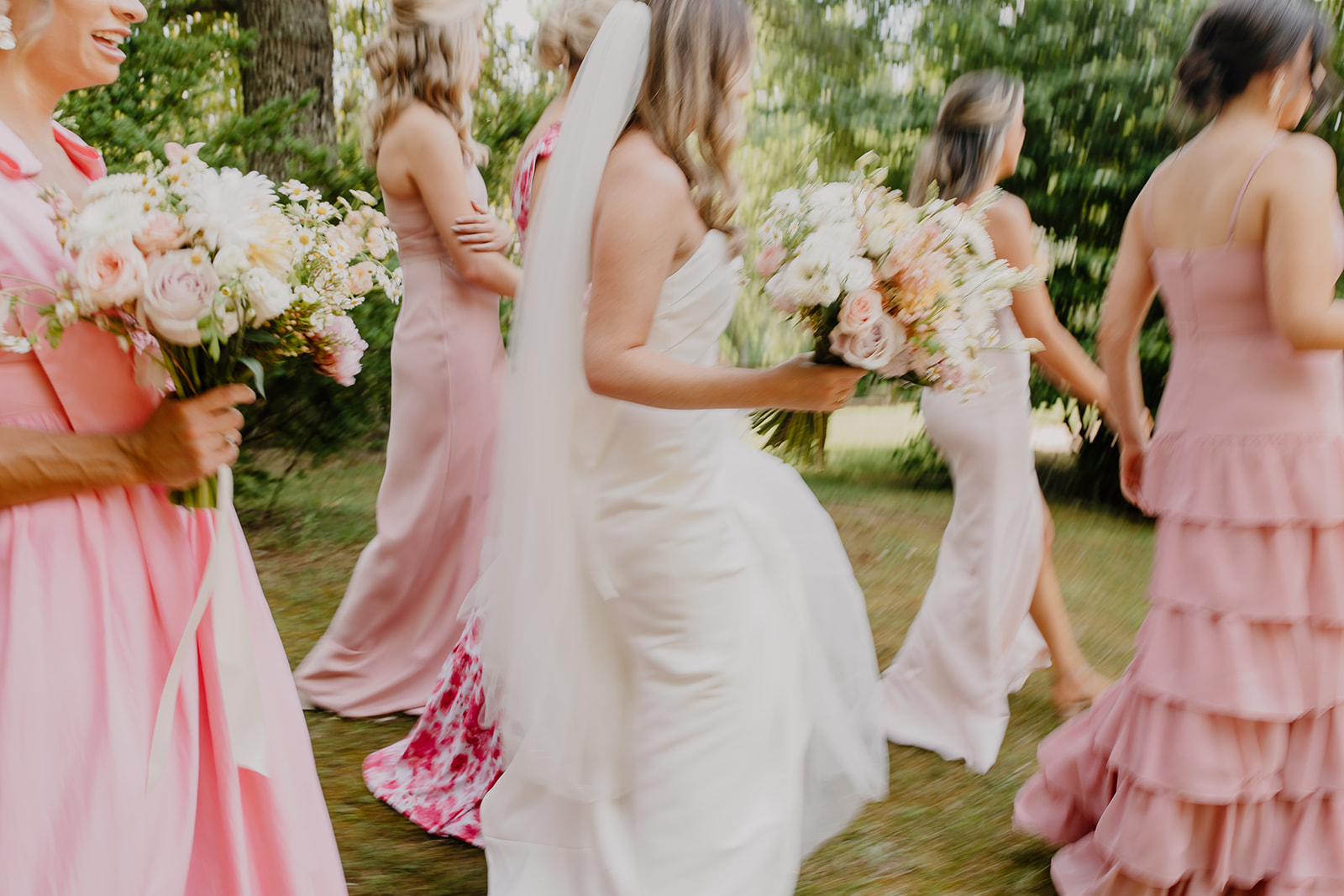 mixed-matched pink bridesmaids dresses