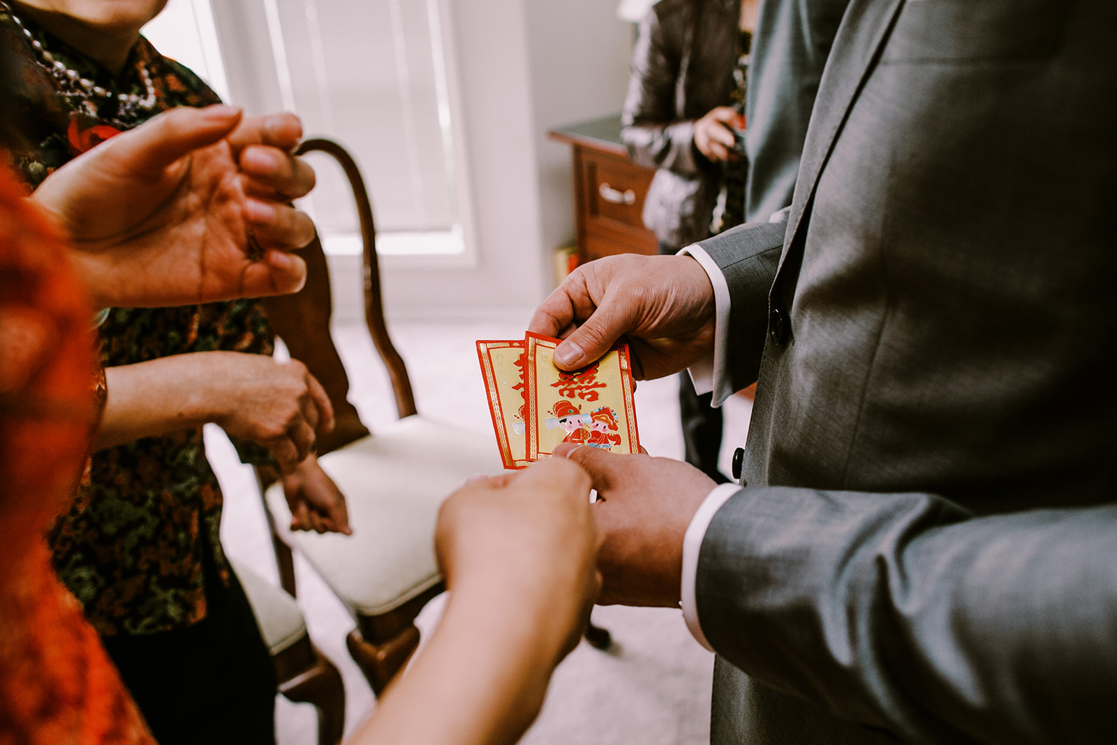 Gifts of Lucky Red Envelopes to the bride Chinese wedding tea ceremony