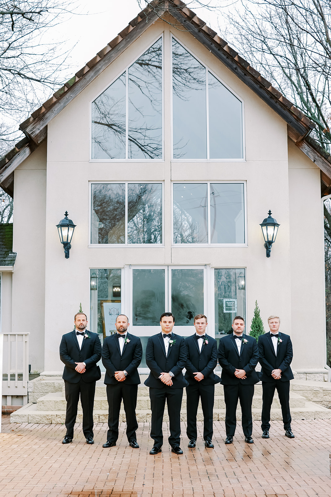 groomsmen at glass chapel