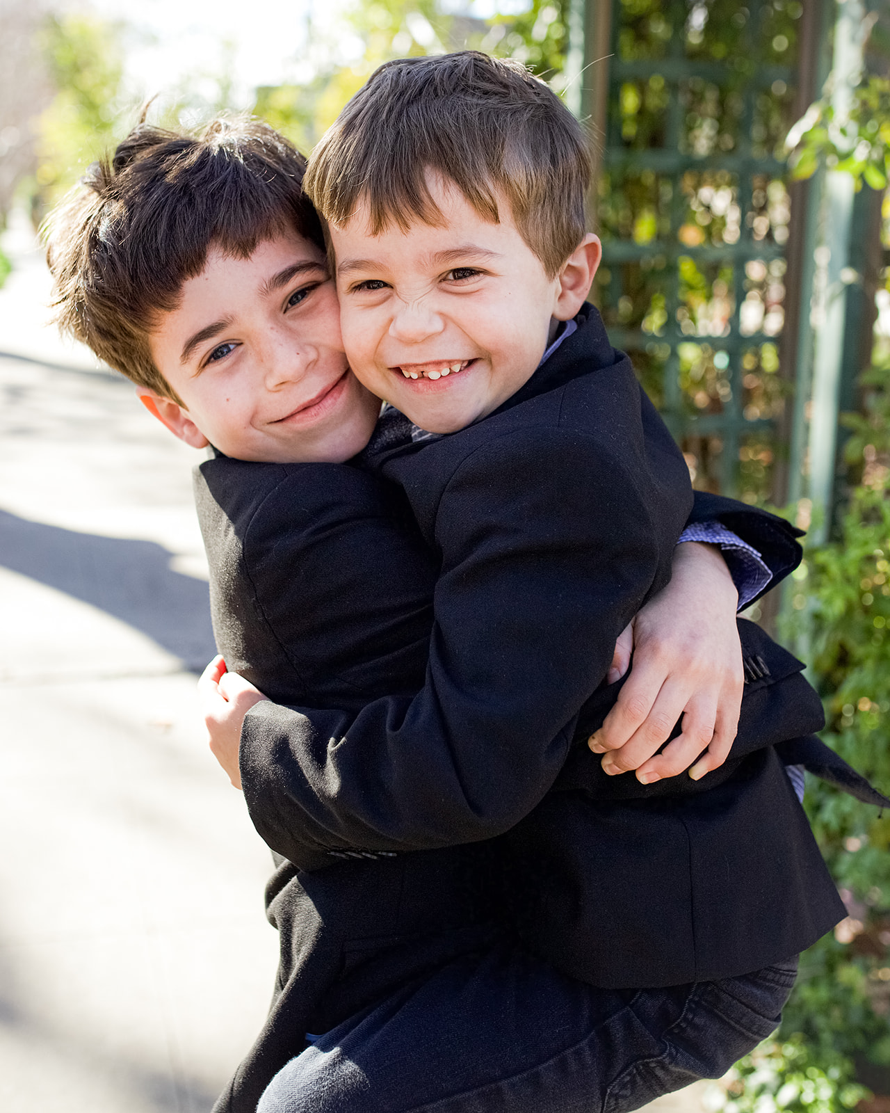 little boys hugging