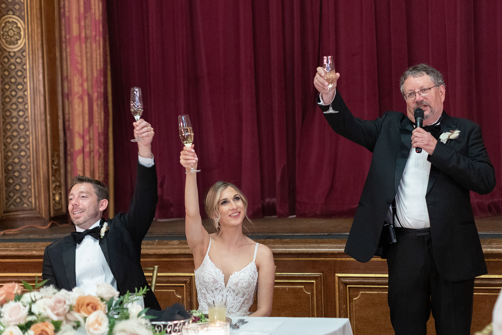 Father of the bride toasts newly weds.