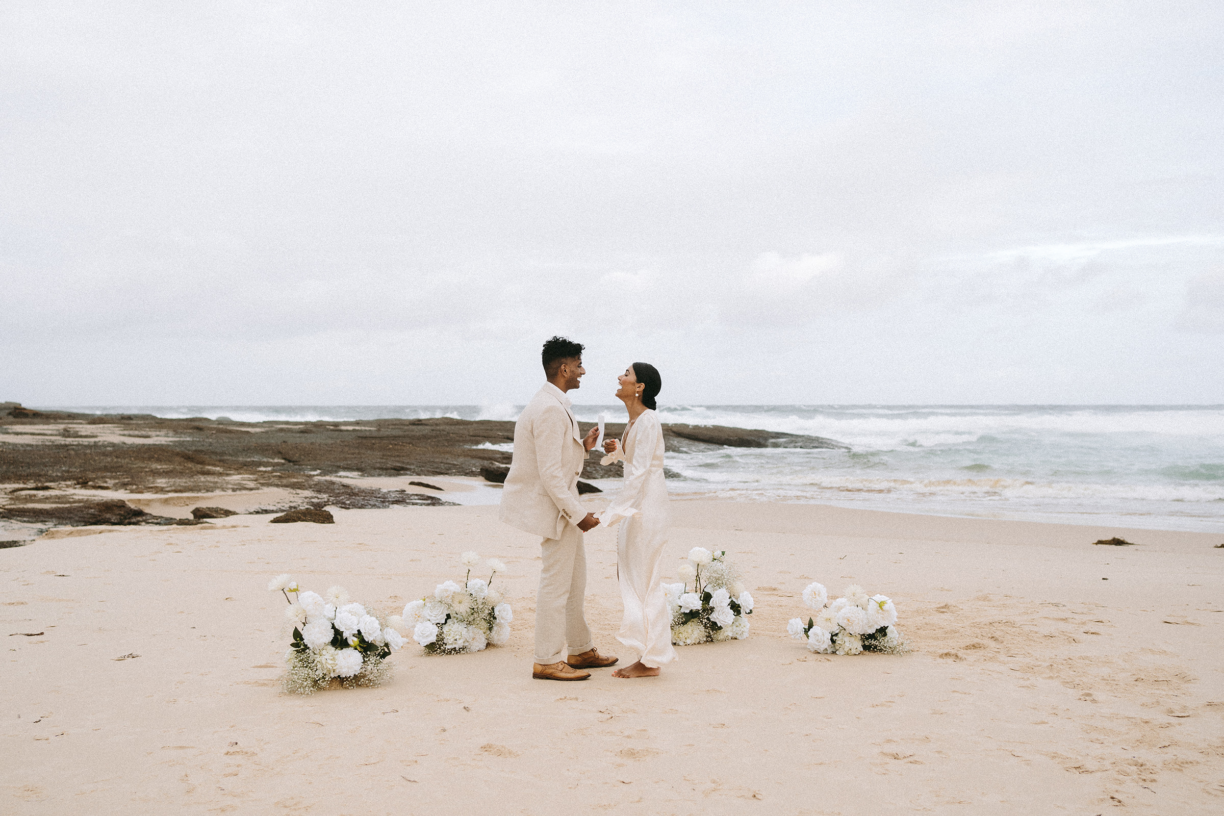 dramatic beach elopement couple modern and stylish