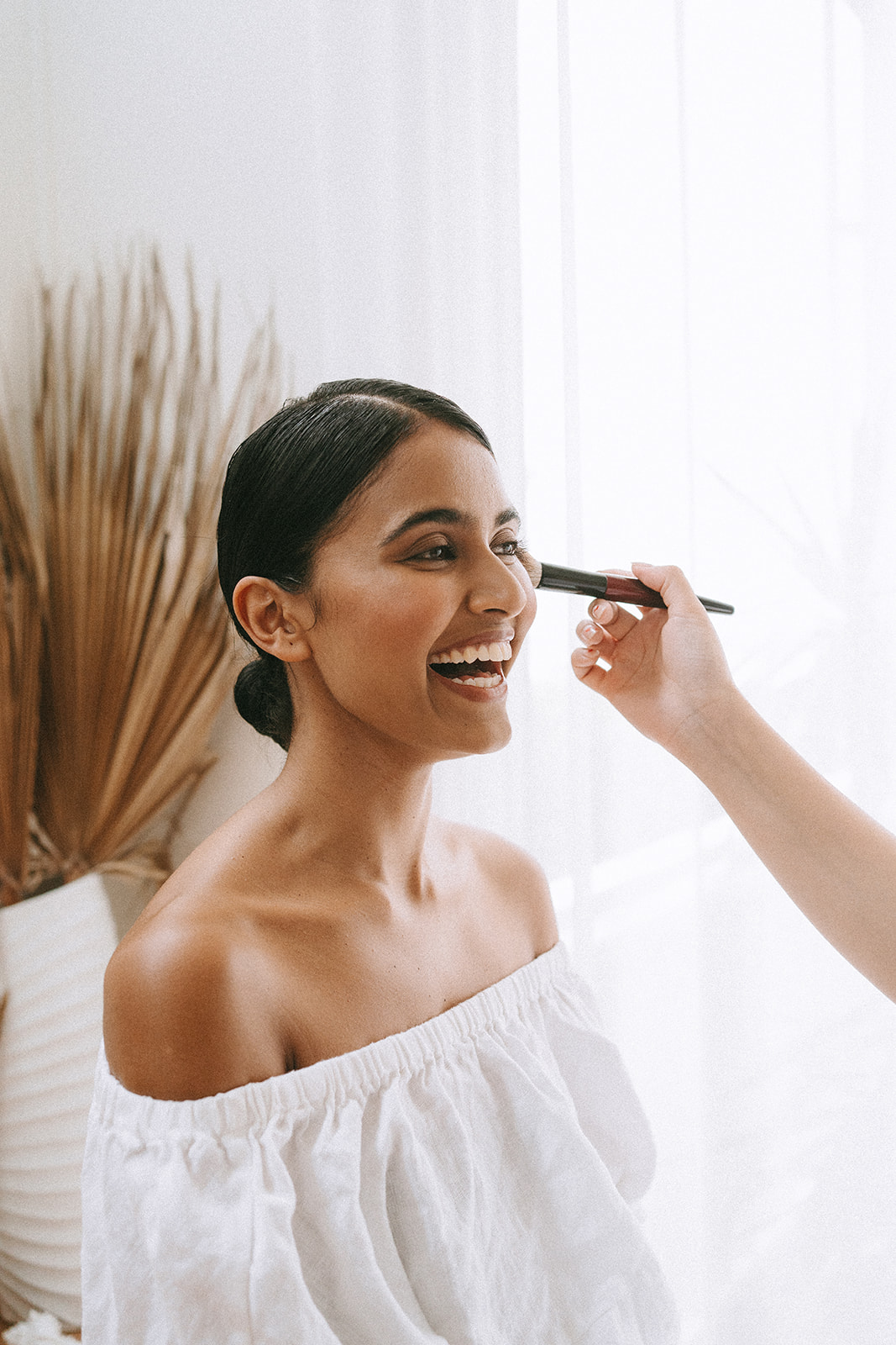 Modern bride getting ready photographed by destination wedding photographer Claire Coulthard