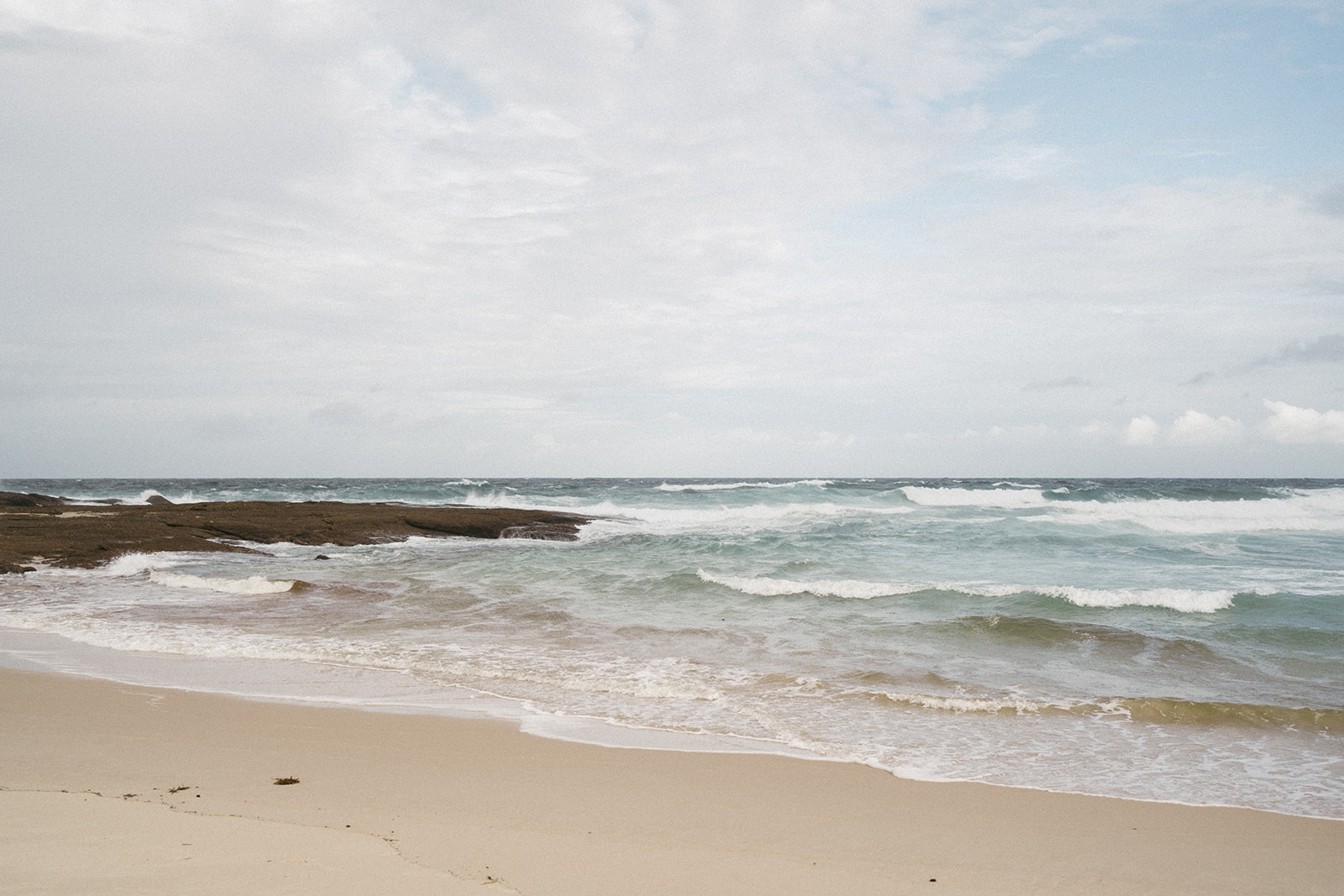 Tropical beach elopement destination wedding photographer Claire Coulthard based in UK
