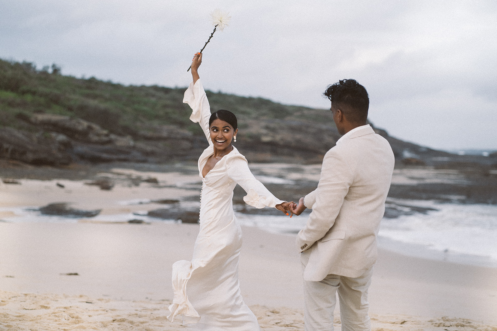 playful wedding photography couple elopement on a beach 
