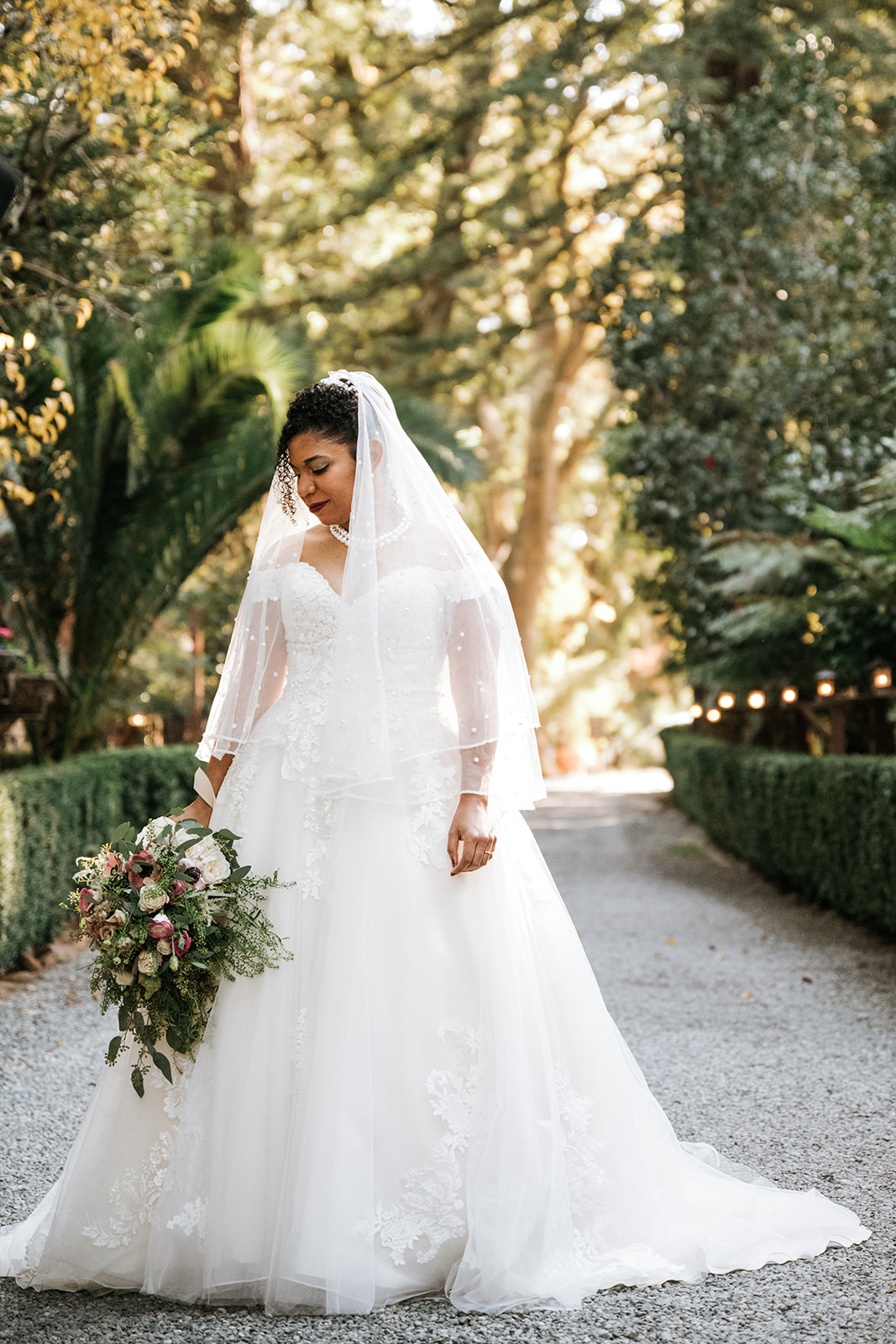 Bride with flowers in the Redwoods