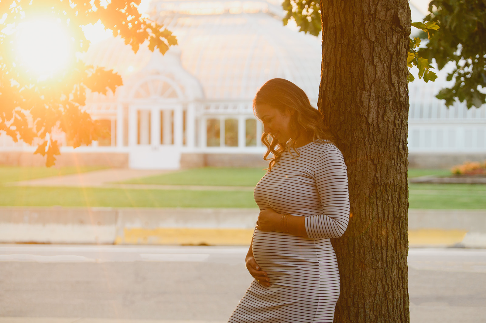 Maternity Photos of a gorgeous backlit lit mom to be 
