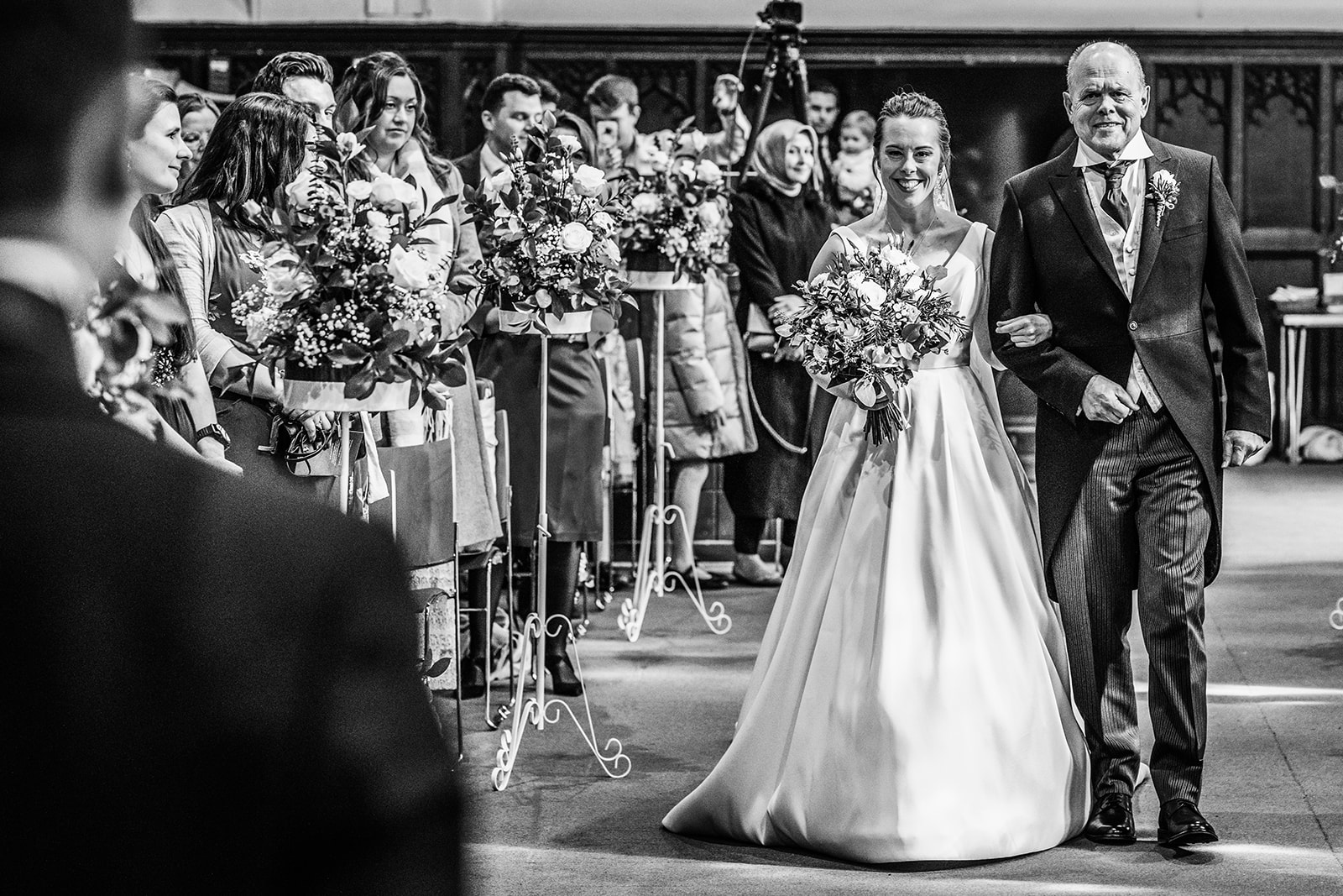 The bride and her father walking down the aisle