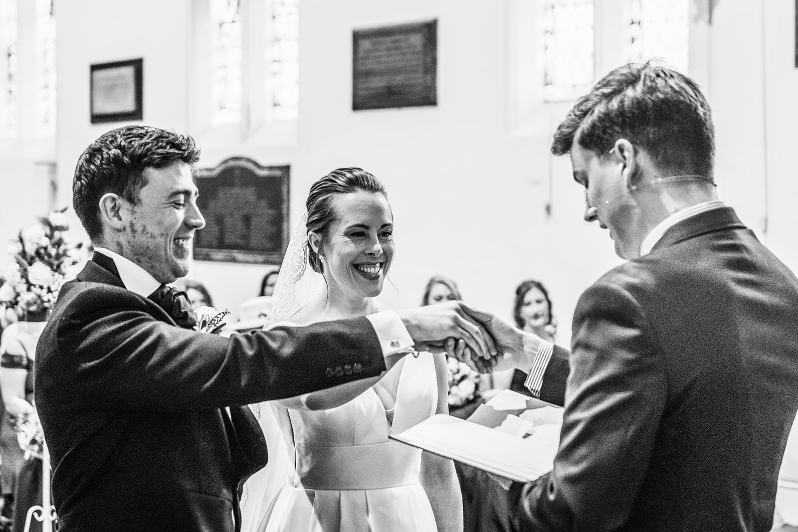 The bride and groom getting married at a church