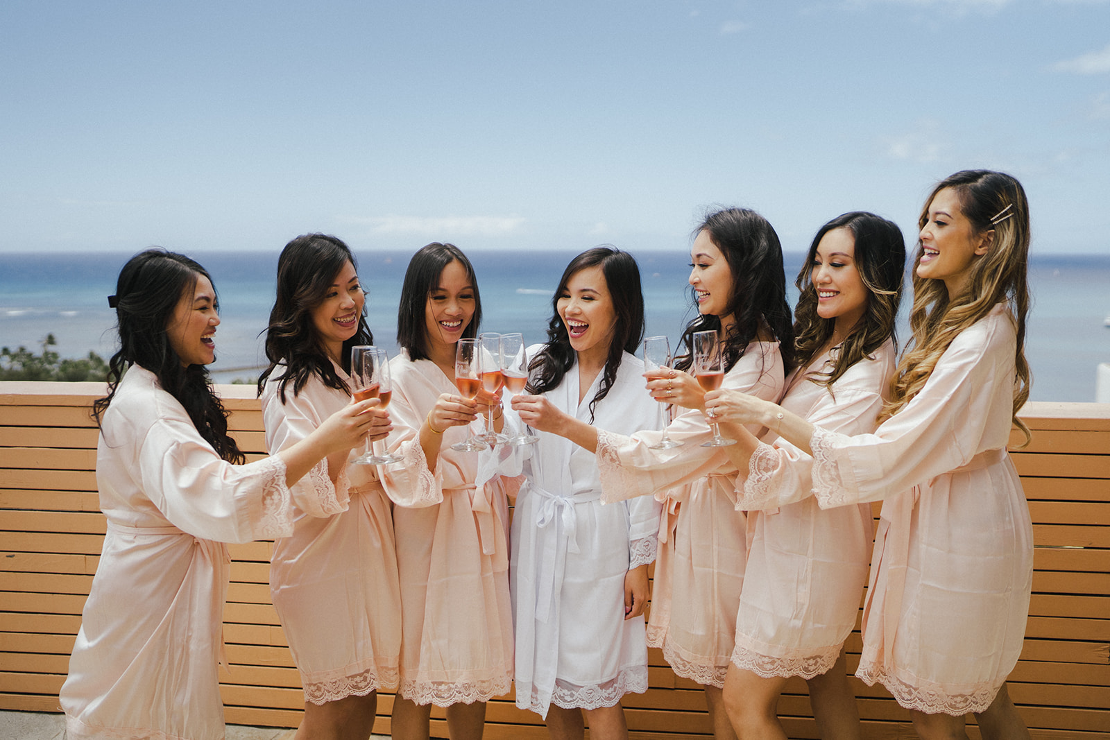 Bride and Bridesmaids getting ready for the wedding at the Queen Kapiolani Hotel