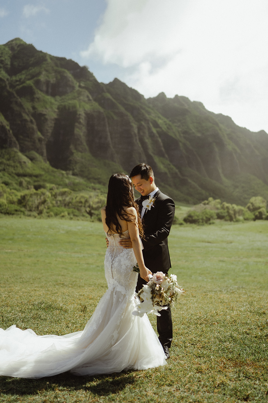 First look with the Bride and Groom before their wedding at Kualoa Ranch Hawaii