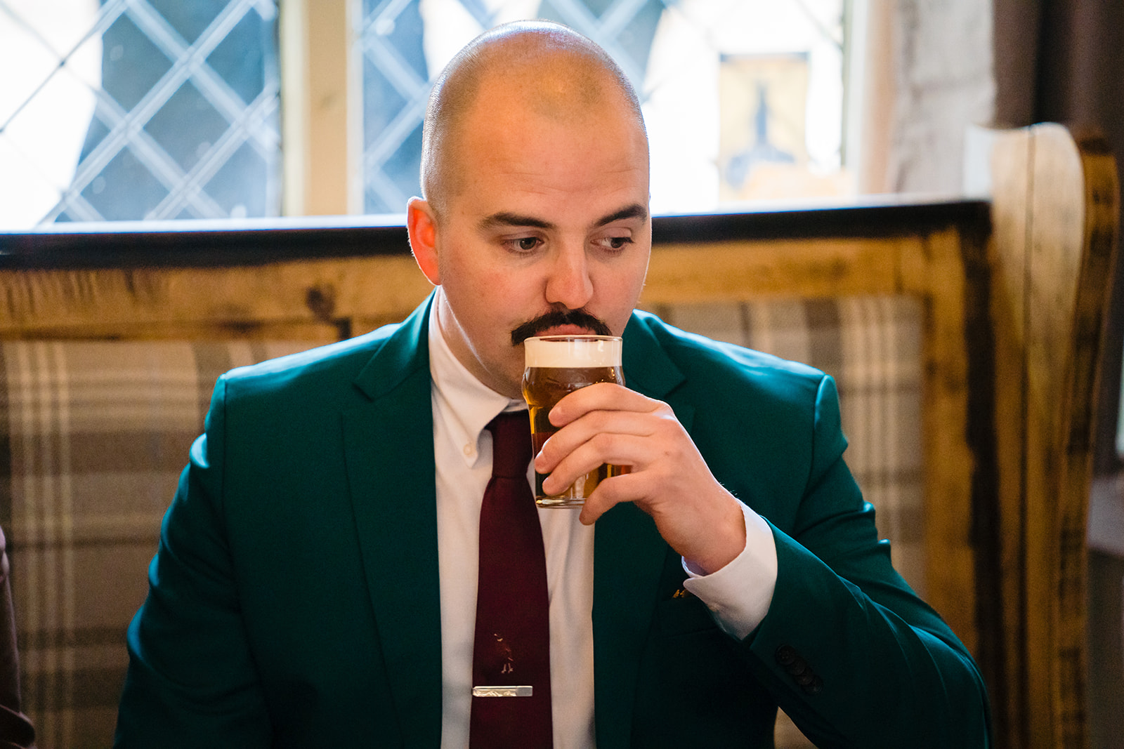 groom drinks a pint