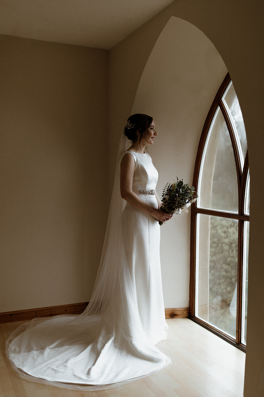 The bride takes a moment before the rest of her unforgettable intimate wedding in Shetland.