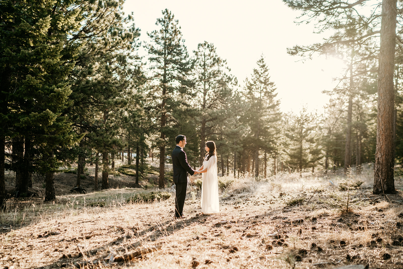 Romantic sunrise wedding on top of a mountain with insane beautiful views in Boulder, Colorado. 