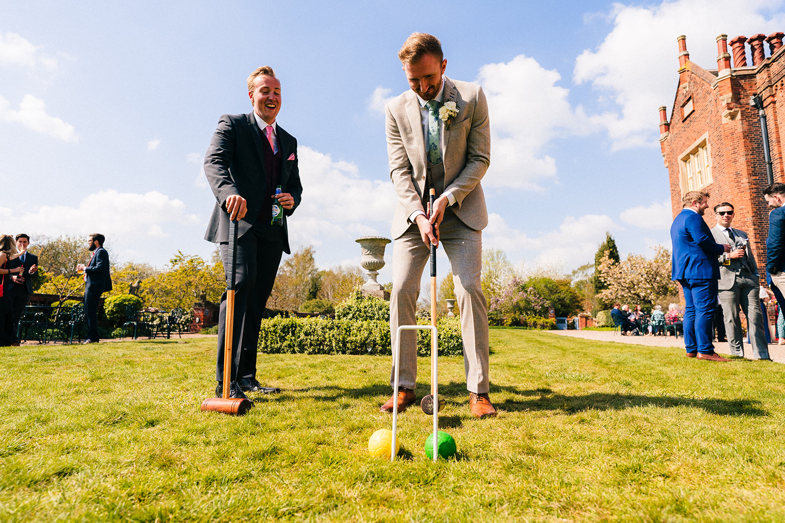 The wedding guests playing a game of croquet