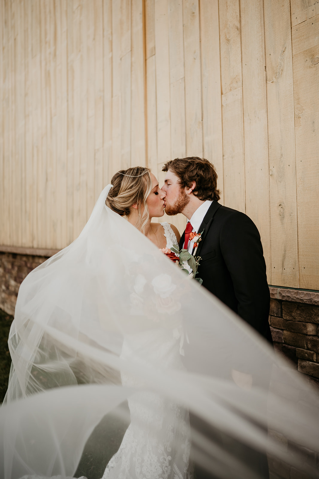A wedding couple who married in Bancroft, MI at a rustic wedding barn.