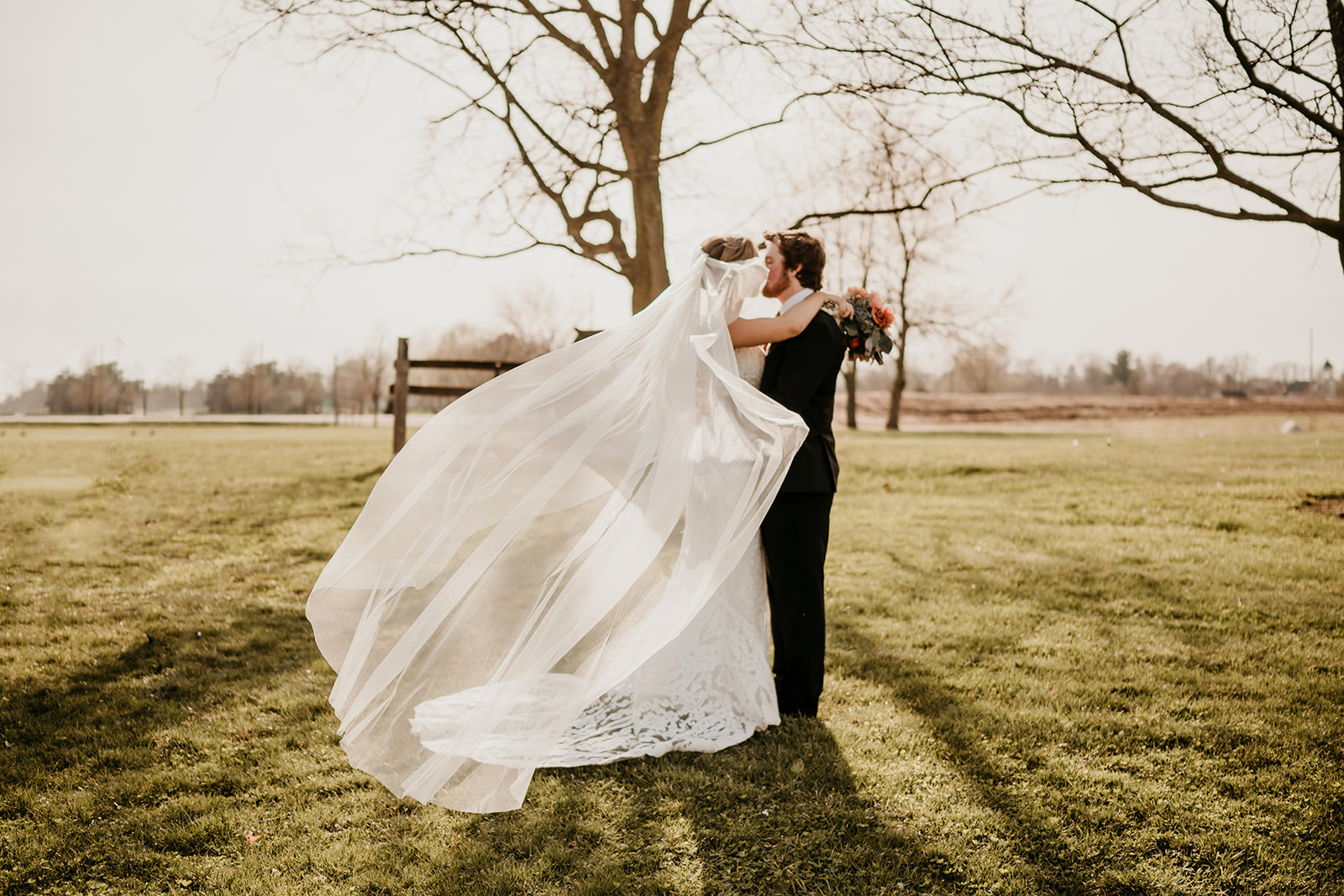 A wedding couple who married in Bancroft, MI at a rustic wedding barn.