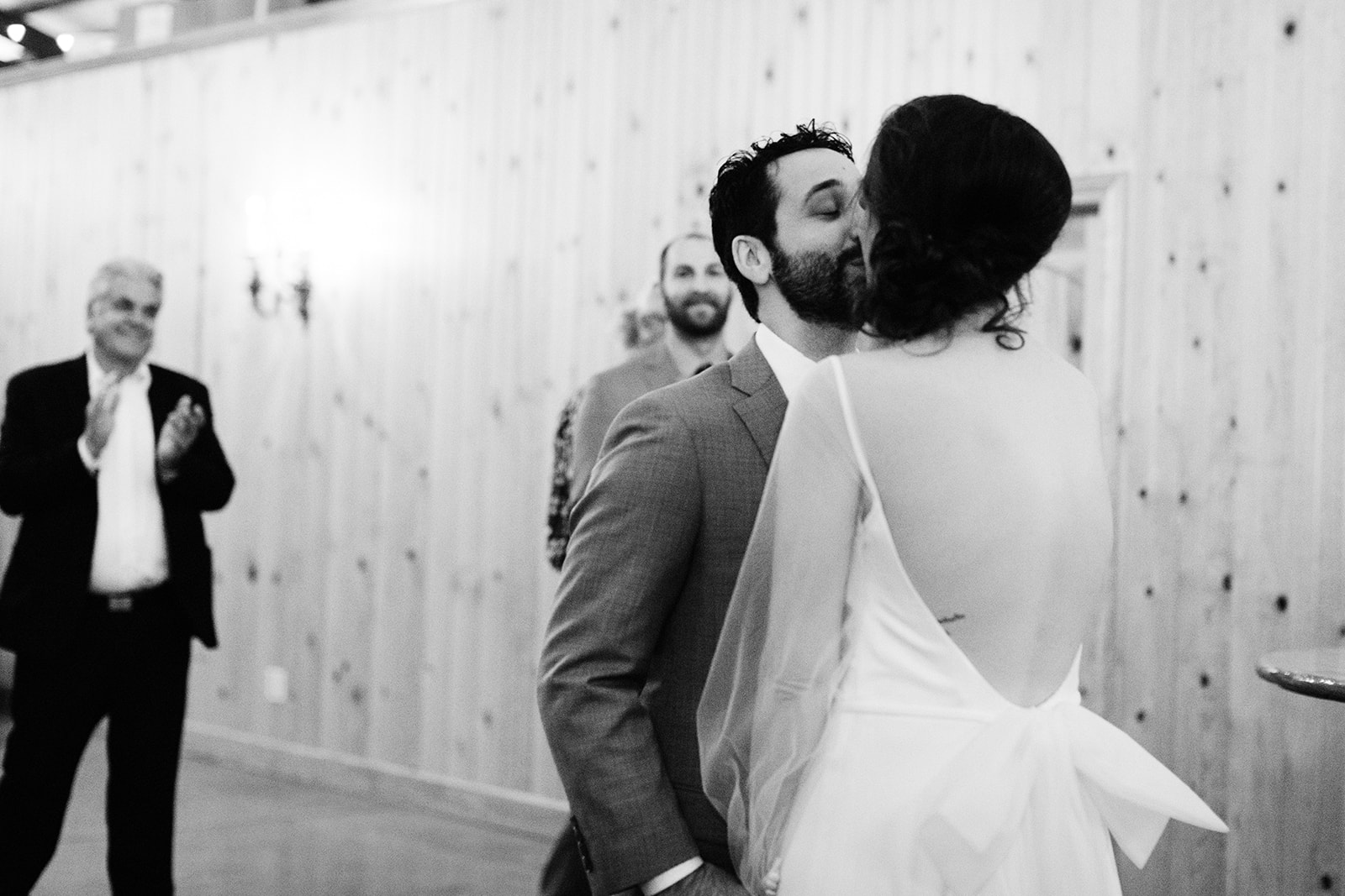 Jewish wedding couple kisses at Hudson Farm