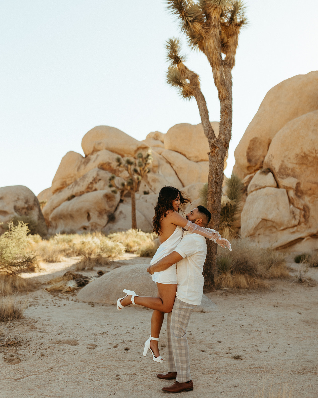classic car engagement photos in joshua tree national park