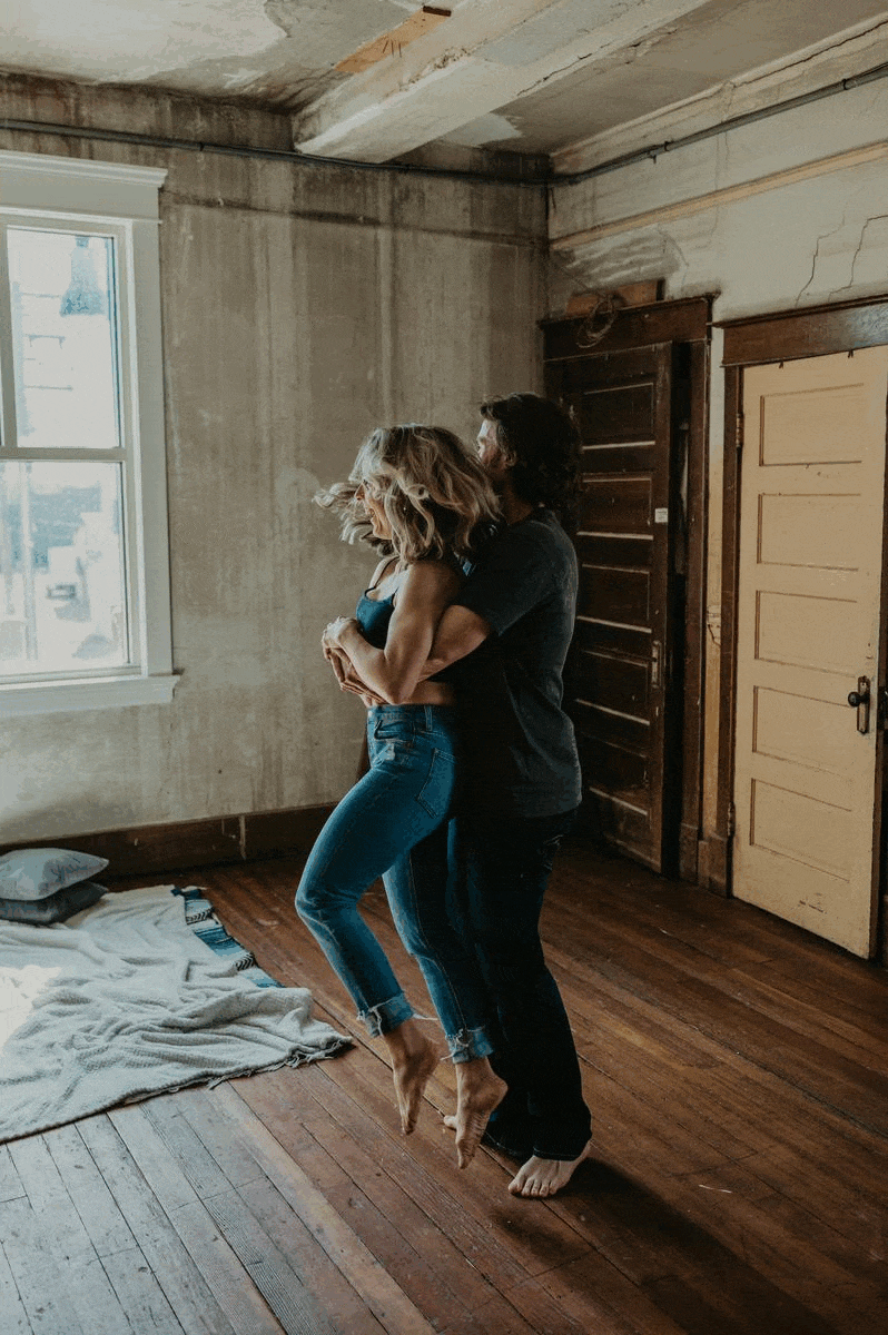 A couple has an intimate coffee date engagement session in a loft space in Vermilion Alberta.
