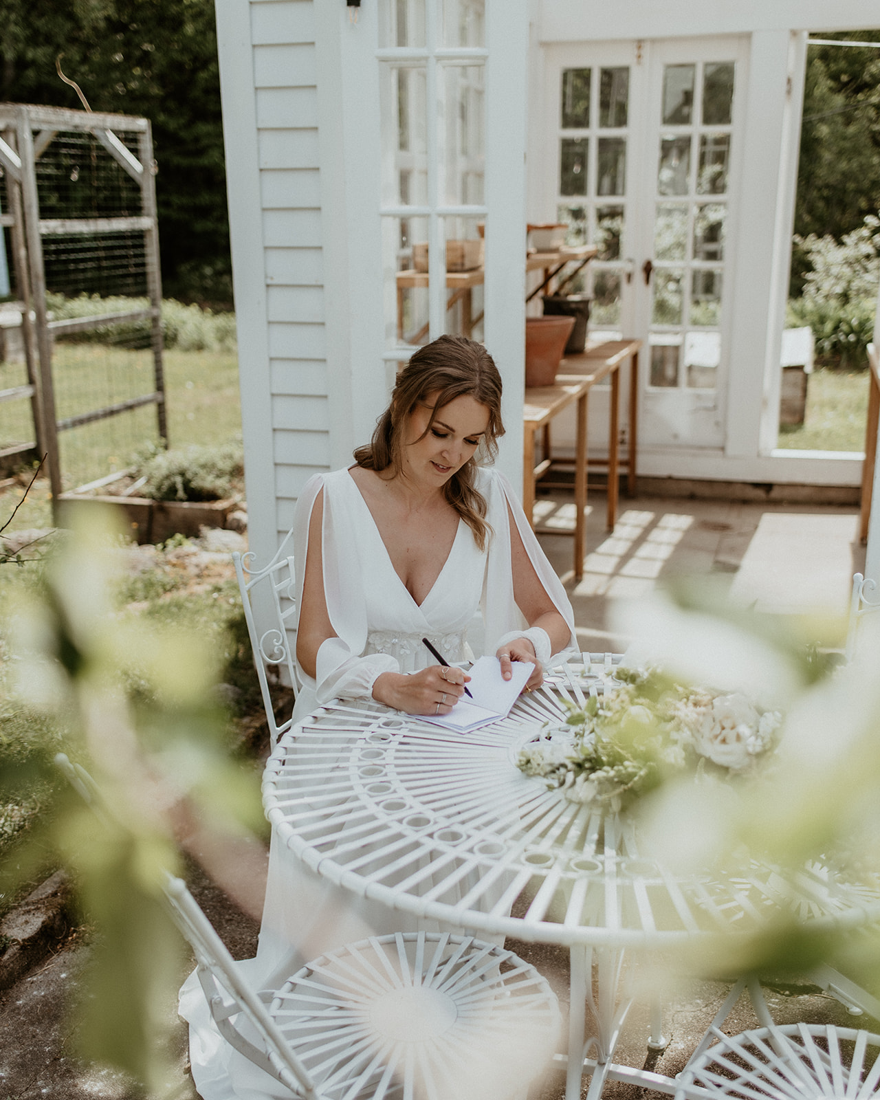 Bride writes wedding vows in gardens of Horse and Hound Inn before her elopement