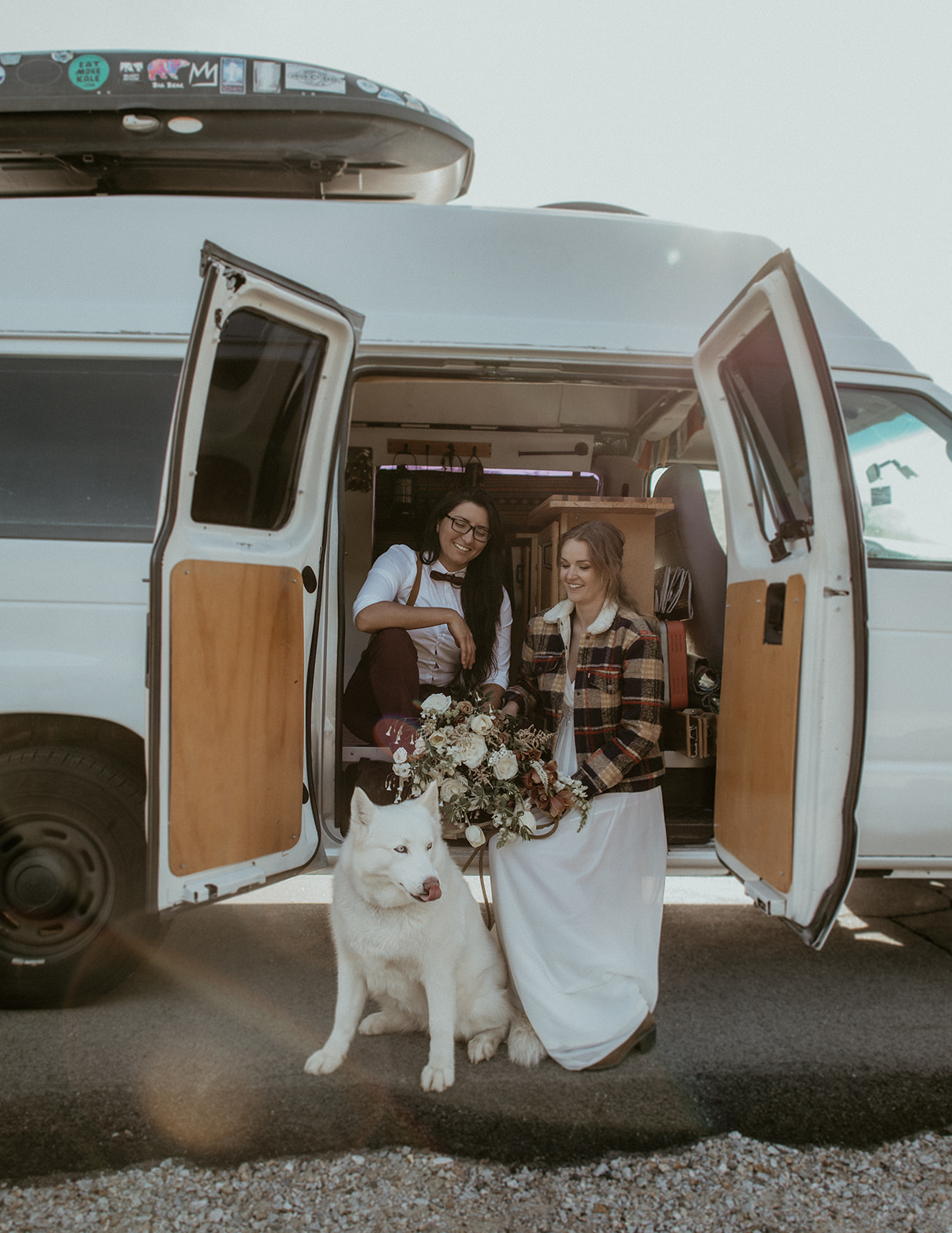 Elopement Couple pose with camper van at Mount Willard Base