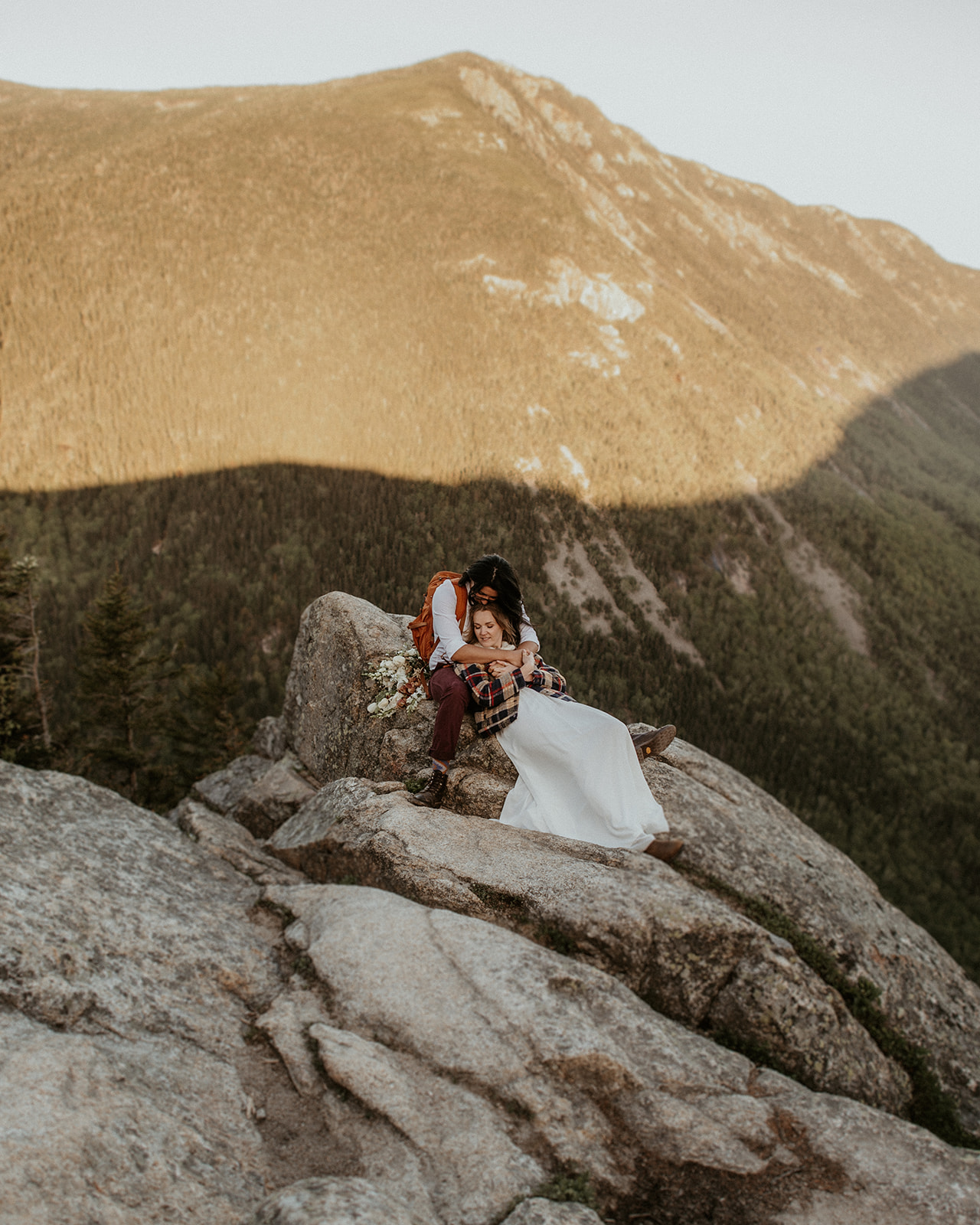 Brides Pose atop Mount Willard during elopement