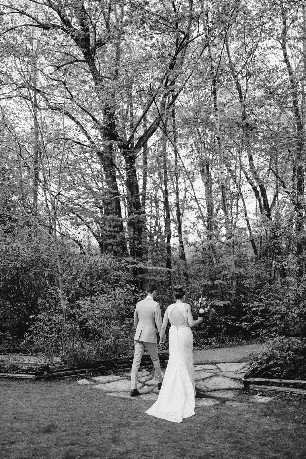 bride and groom have their ceremony at schlitz audubon nature center in milwaukee wisconsin