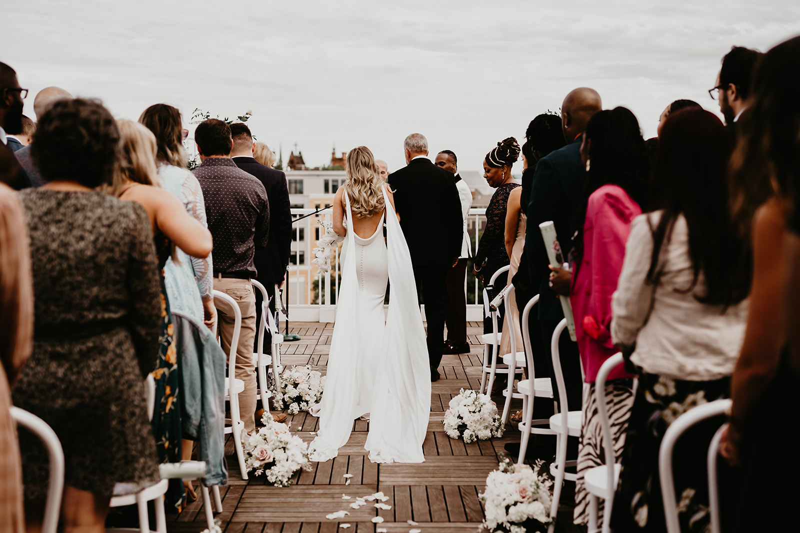 Chic rooftop wedding at The Lantern Room in Cleveland, Ohio - bride and groom exchanging vows.