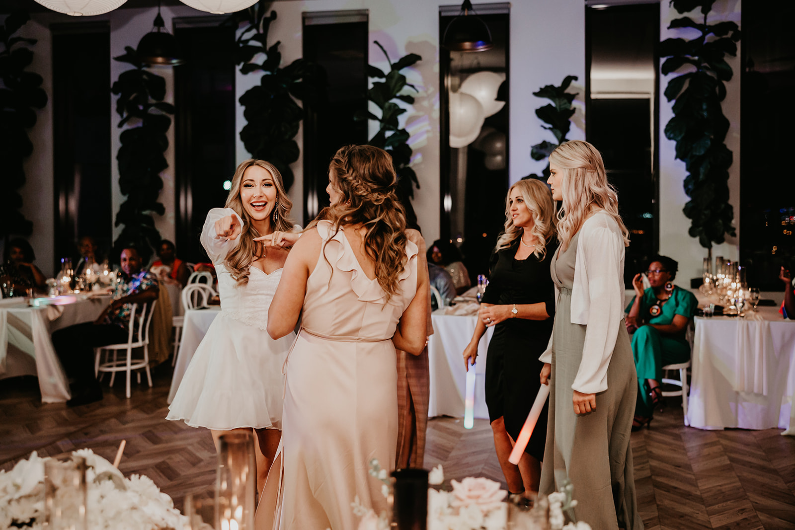 Joyful wedding guests dancing and celebrating at The Lantern Room in Cleveland, Ohio - capturing the energy of the event