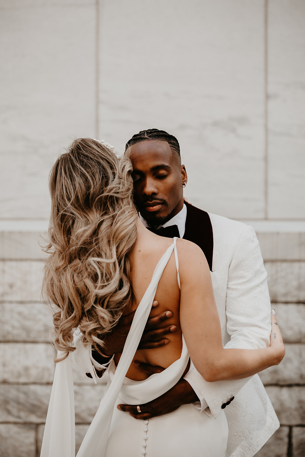 Stunning couple's portrait in downtown Cleveland - exuding modern elegance and timeless charm.