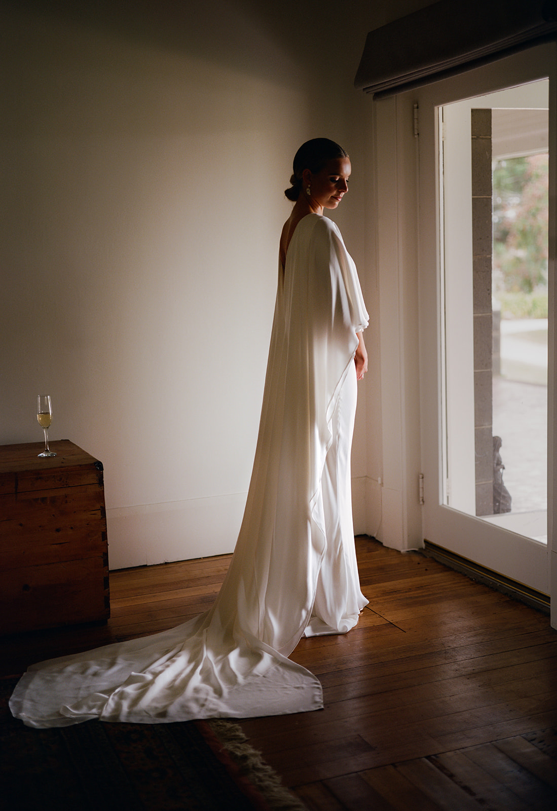A Bride in front of a window