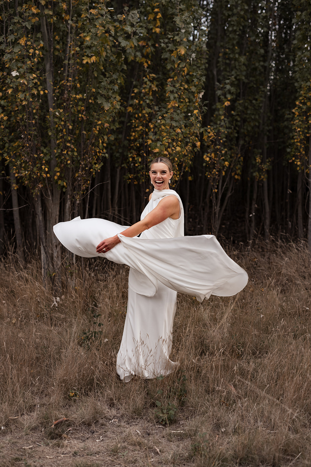 Bride twirling her dress