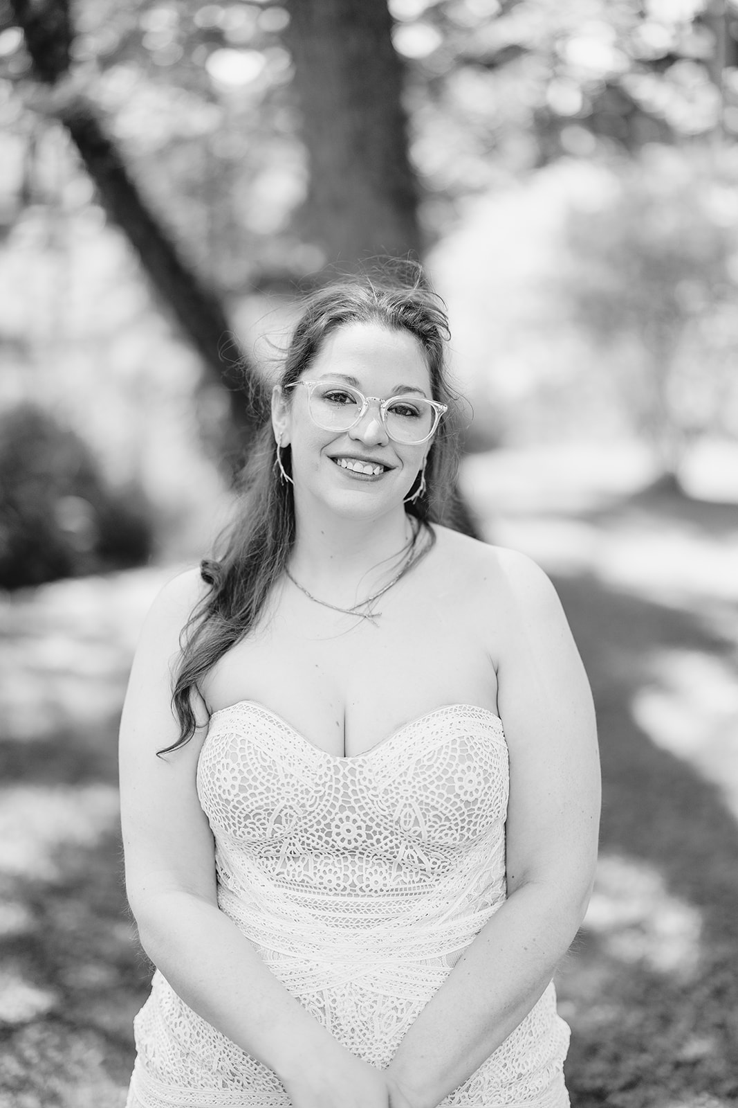 bride smiles at the camera during their intimate backyard wedding in central wisconsin