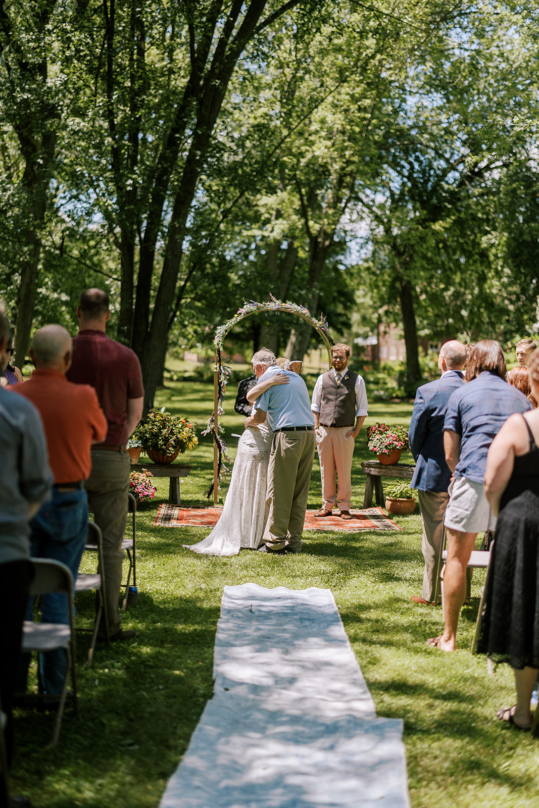 couple gets married in an intimate backyard wedding in central wisconsin