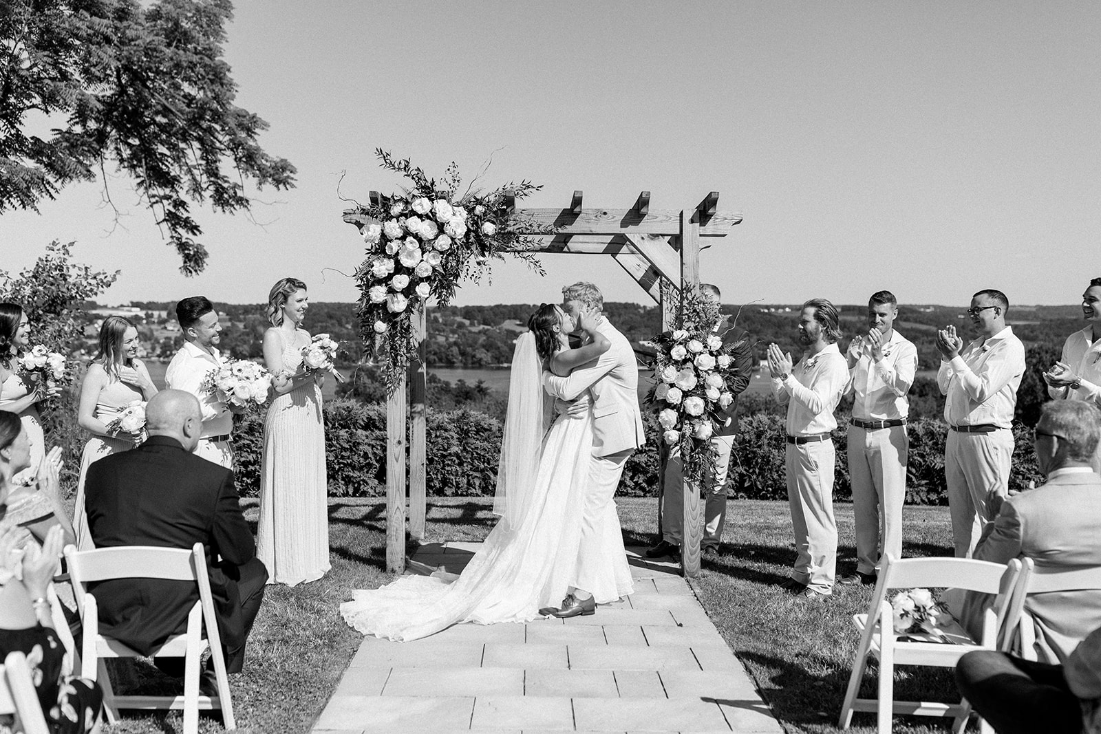 The bride and groom's first kiss at Crispin Hill.