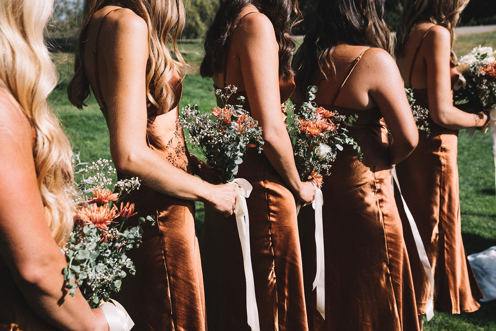 Beautiful summer wedding florals and bridal party dresses for this Santa Barbara Elings Park wedding ceremony.