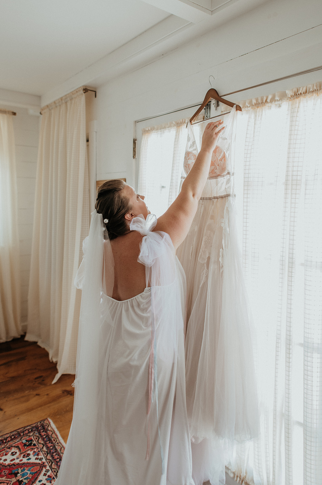 Bride with her willow by watters wedding gown