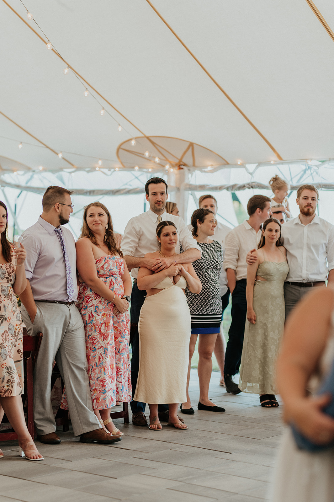 guests react to bride and groom first dance
