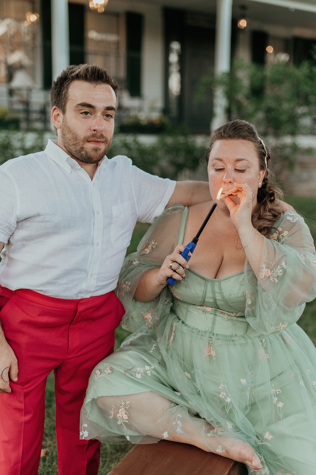 Bride and groom change into reception outfits and share a joint