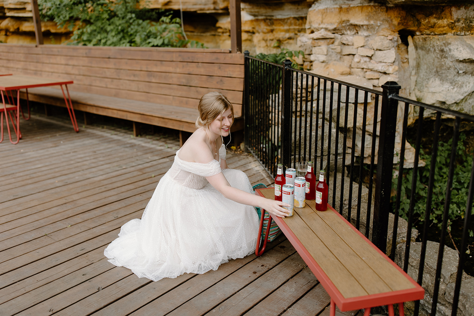 Bride setting up drinks to ICE her friends