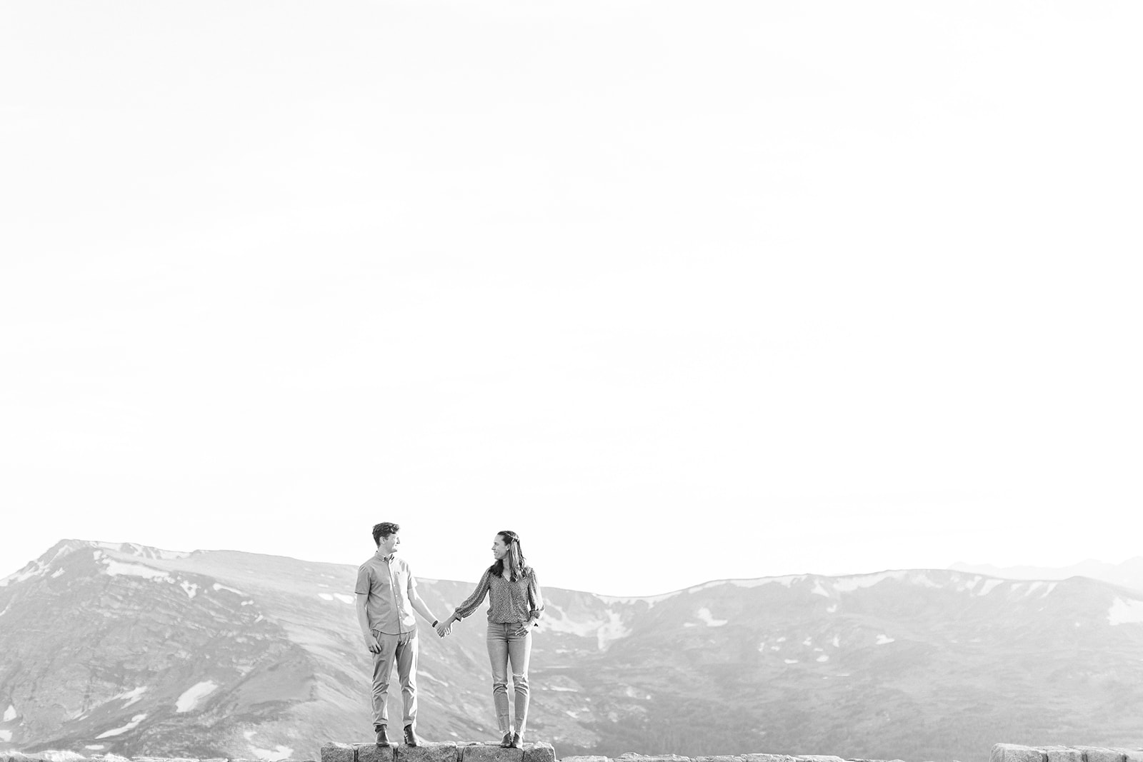 black and white engagement portrait of couple in Rocky Mountain National Park