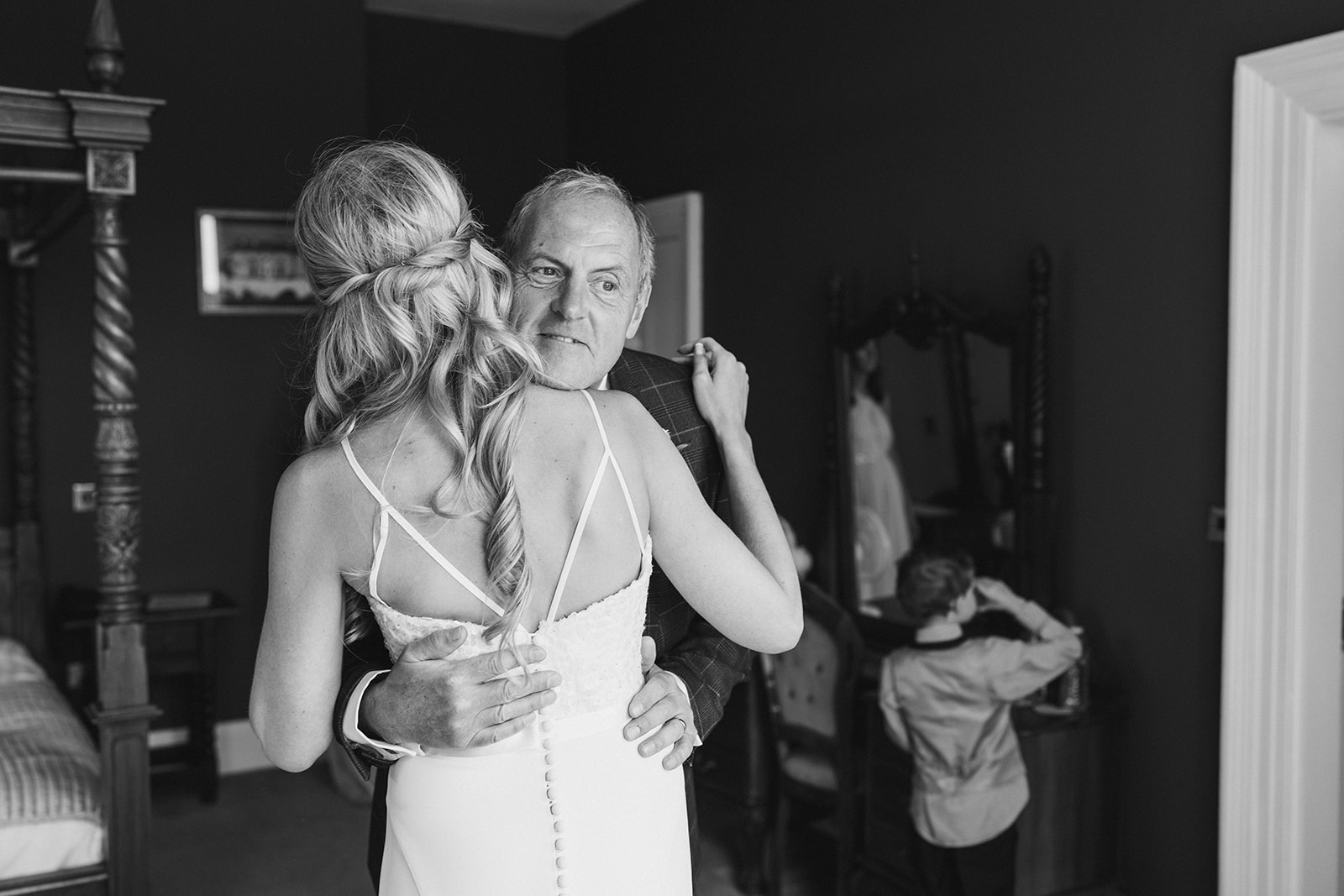 Shottle Hall Wedding Photography - father of the bride, and his daughter hugging on the morning of her wedding
