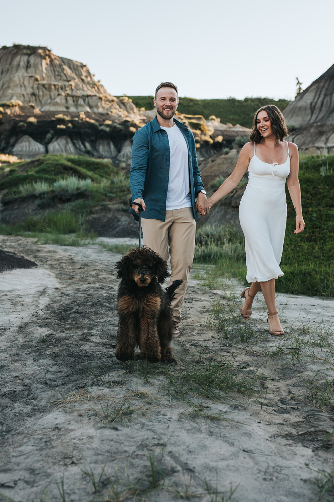 A couple's summer Engagement Photography Session at Horseshoe Canyon with puppy