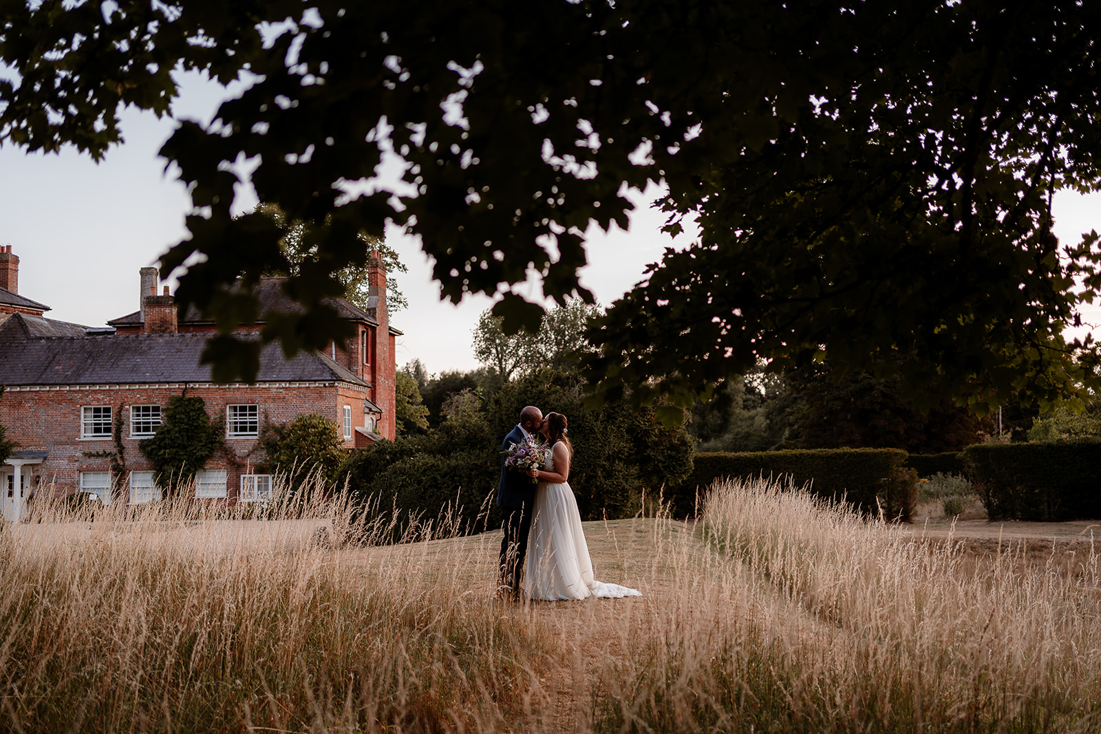 Golden hour couple photos at Syrencot wedding venue
