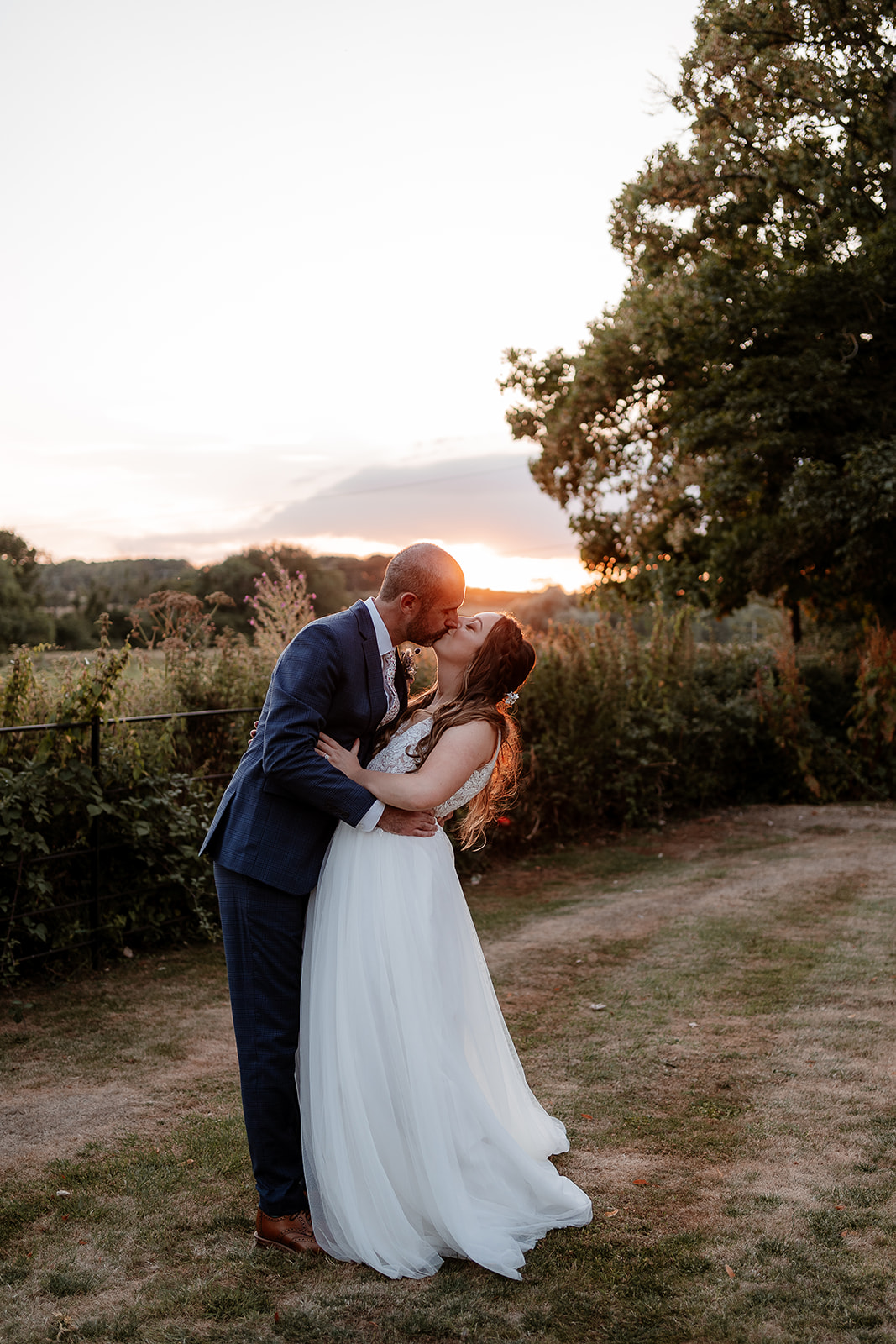 Golden hour couple photos at Syrencot wedding venue